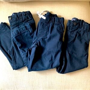 3 pairs of navy blue bottoms. Worn as school uniforms. Like new.